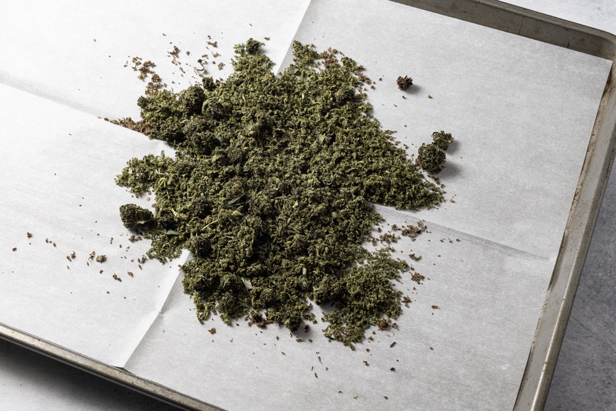 Cannabis flower on a baking tray